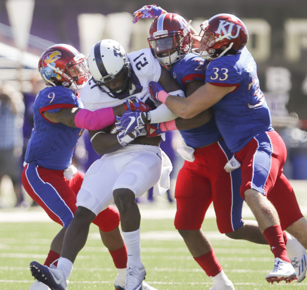 KU Football notebook Keith Loneker Jr. solid in first start for